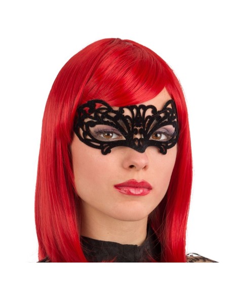 Maschera veneziana nera intagliata con velluto indossata da donna con capelli rossi per Carnevale