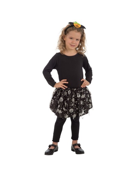 Bambina che indossa tutù nero con stampe argentate e maglietta nera per costume festa