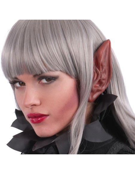 Orecchie da diavolo rosse indossate su volto femminile per costume Halloween demoniaco spaventoso