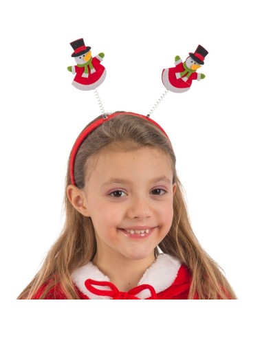 Cerchietto natalizio con pupazzi di neve rossi su molle indossato da bambina sorridente