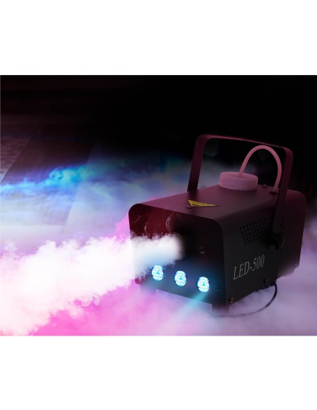 Macchina del fumo elettrica nera con LED colorati che produce dense nuvole di vapore illuminato