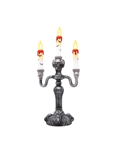 Candelabro gotico argento con tre candele illuminate per decorazioni Halloween horror