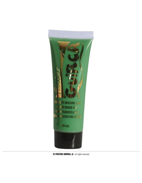 Tubetto trucco crema verde scuro per makeup carnevale Halloween con applicazione su viso donna
