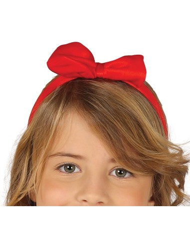 Bambina indossa costume Biancaneve con corpetto blu, gonna dorata e fiocco rosso per Carnevale