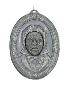 Ritratto parlante decorativo con volto inquietante in cornice ovale per Halloween horror