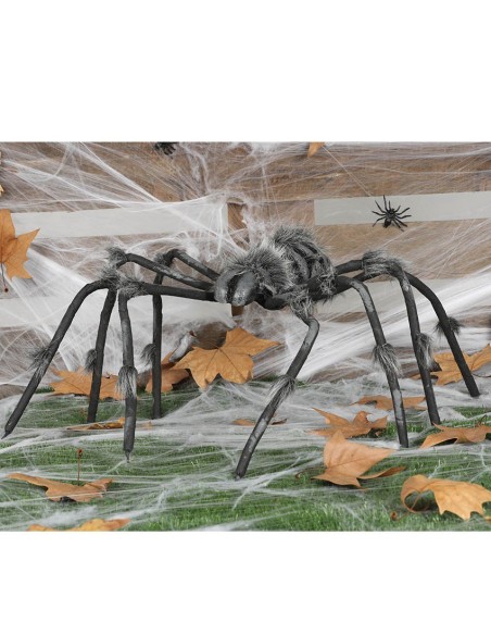 Ragno gigante nero da 120 cm con zampe lunghe per decorazioni Halloween horror su foglie autunnali